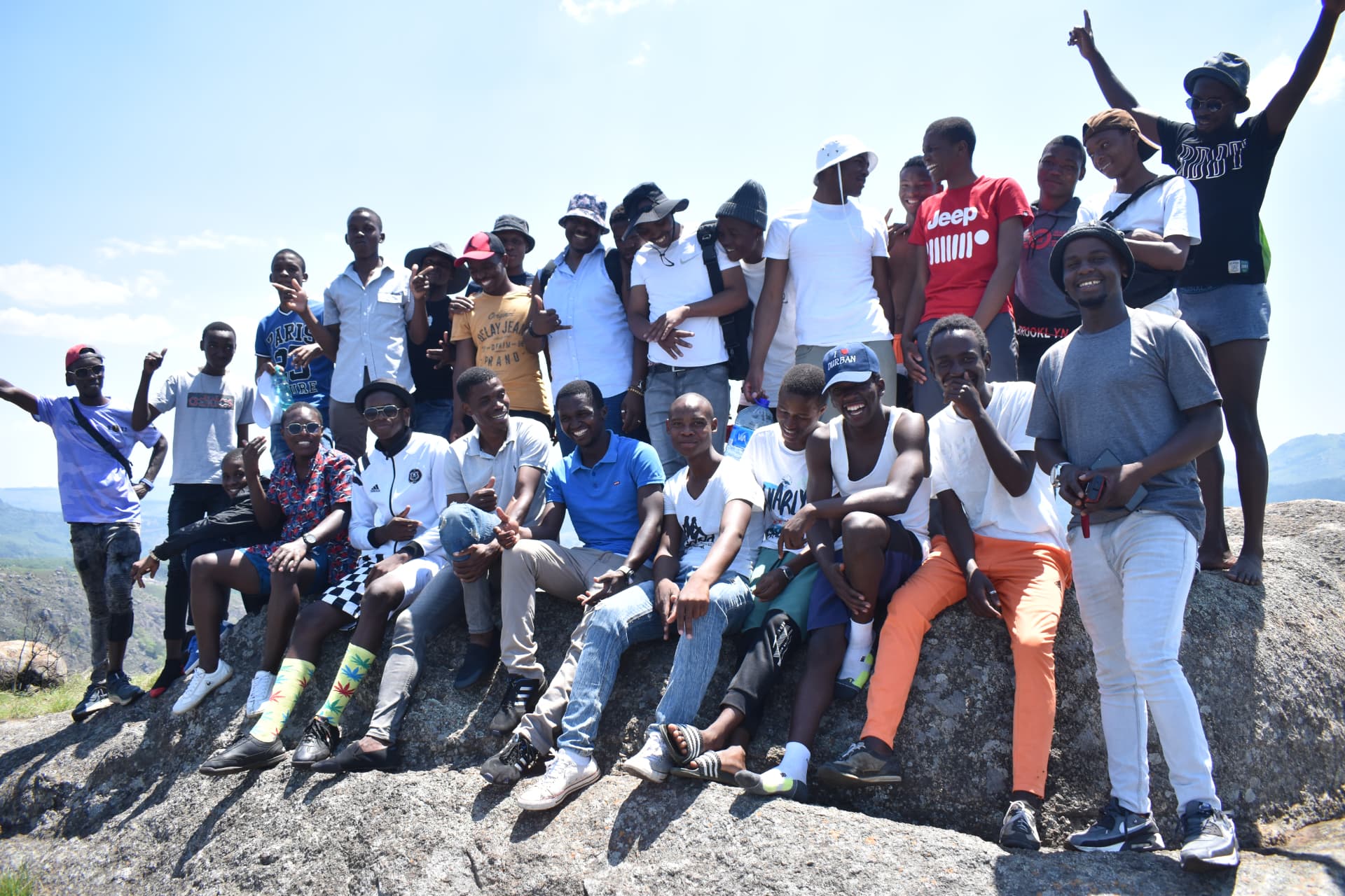 OFF Lisango group photo on a rock overlook